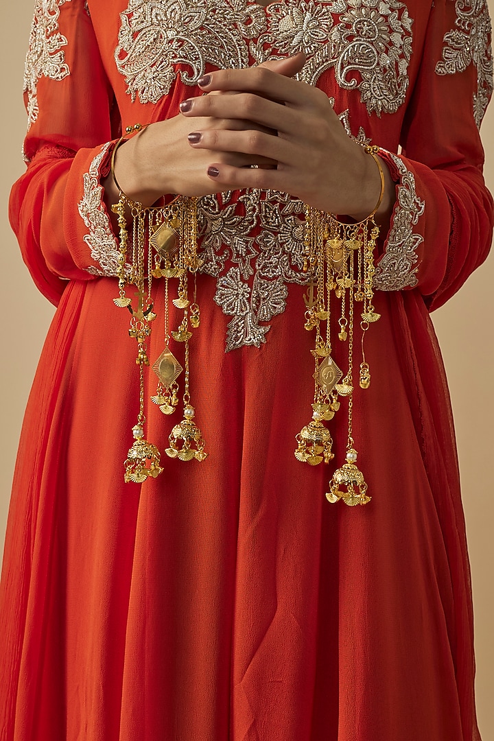 Gold Finish Kundan Polki & Charms Hanging Kaleeras (Set Of 2) by Vivinia By Vidhi Mehra at Pernia's Pop Up Shop