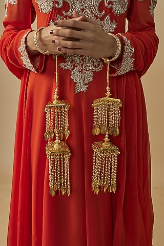 Gold Finish Kundan Polki & Pearl Strand Tying Kaleeras (Set Of 2) by Vivinia By Vidhi Mehra
