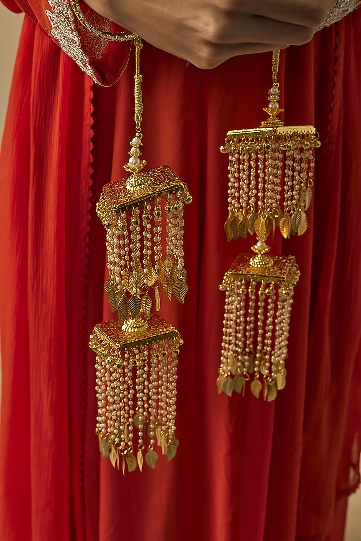 Gold Finish Kundan Polki & Pearl Strand Tying Kaleeras (Set Of 2) by Vivinia By Vidhi Mehra at Pernia's Pop Up Shop