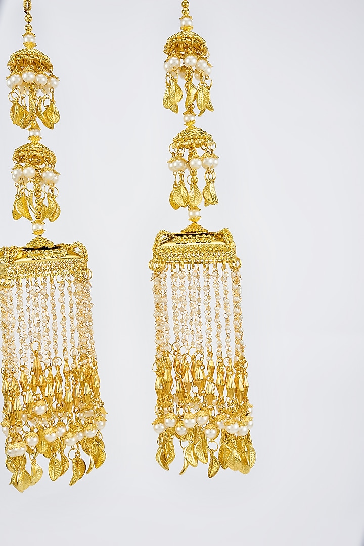 Gold Finish Kundan Polki & Pearl Strand Tying Kaleeras (Set Of 2) by Vivinia By Vidhi Mehra at Pernia's Pop Up Shop
