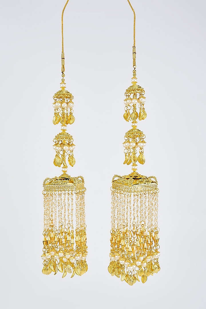 Gold Finish Kundan Polki & Pearl Strand Tying Kaleeras (Set Of 2) by Vivinia By Vidhi Mehra at Pernia's Pop Up Shop