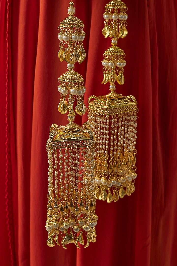 Gold Finish Kundan Polki & Pearl Strand Tying Kaleeras (Set Of 2) by Vivinia By Vidhi Mehra at Pernia's Pop Up Shop