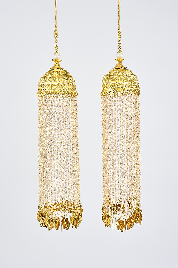 Gold Finish Kundan Polki & Pearl Strand Tying Kaleeras (Set Of 2) by Vivinia By Vidhi Mehra at Pernia's Pop Up Shop
