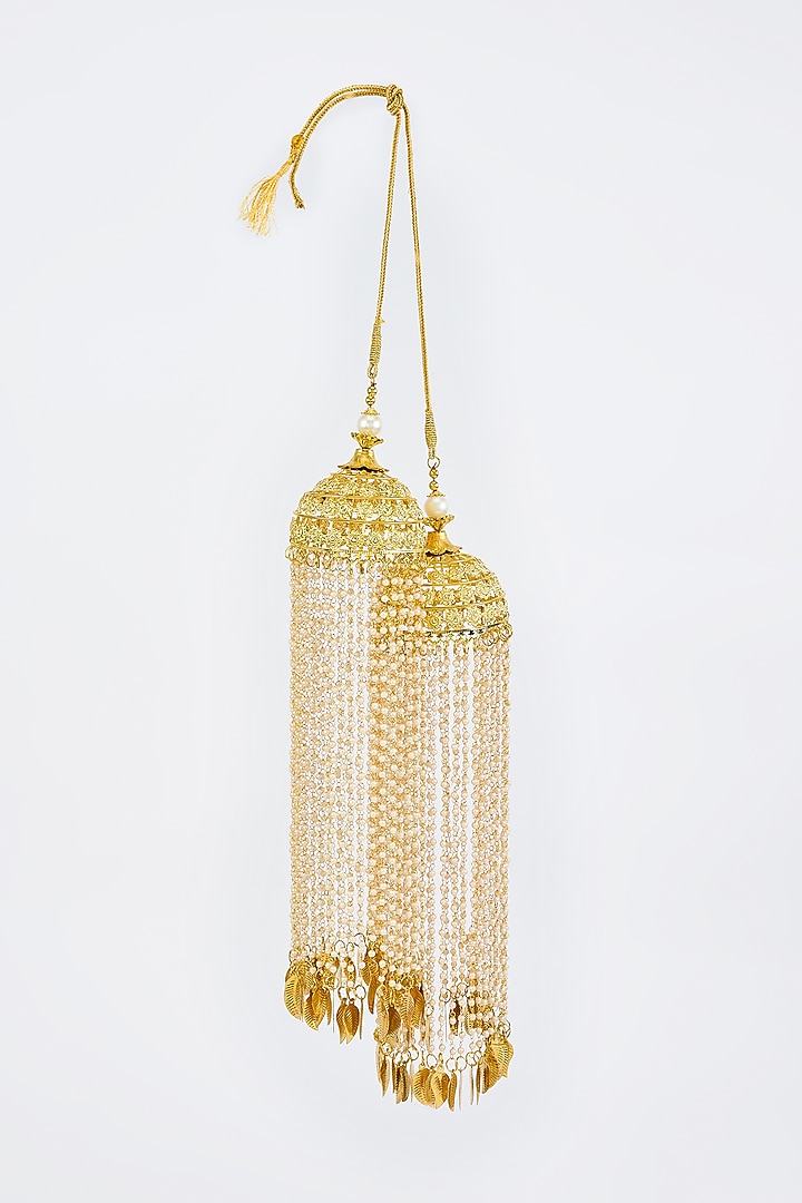 Gold Finish Kundan Polki & Pearl Strand Tying Kaleeras (Set Of 2) by Vivinia By Vidhi Mehra at Pernia's Pop Up Shop