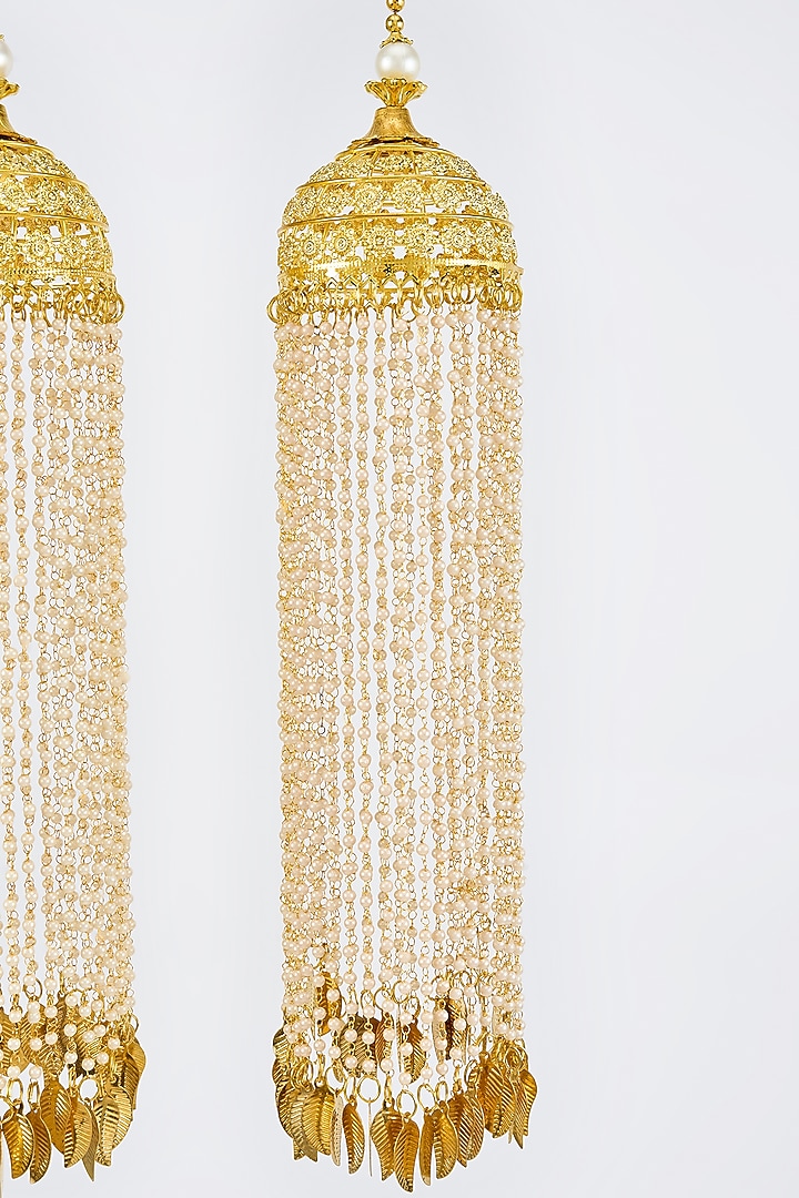 Gold Finish Kundan Polki & Pearl Strand Tying Kaleeras (Set Of 2) by Vivinia By Vidhi Mehra at Pernia's Pop Up Shop