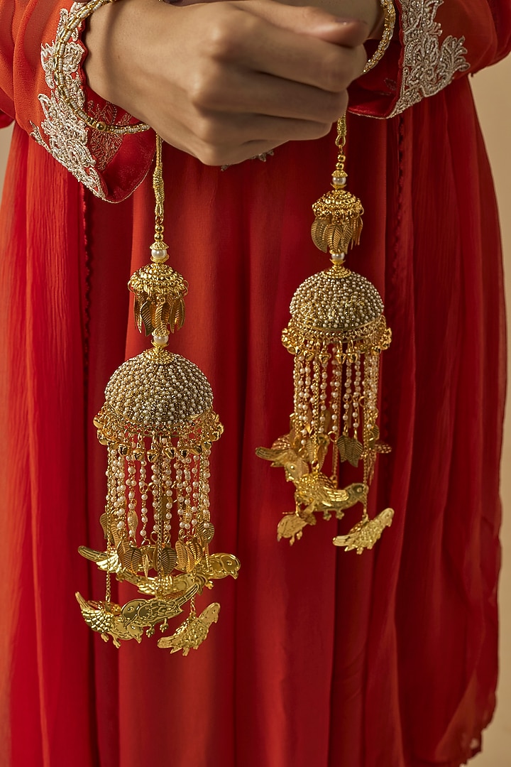 Gold Finish Kundan Polki & Pearl Strand Tying Kaleeras (Set Of 2) by Vivinia By Vidhi Mehra at Pernia's Pop Up Shop