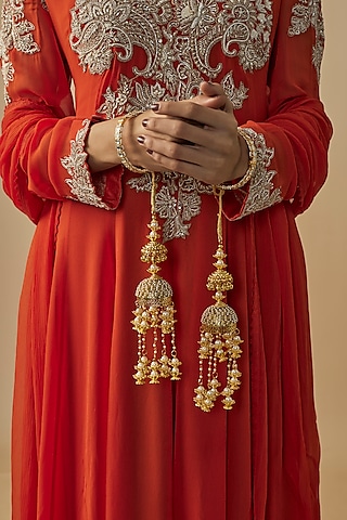 Gold Finish Kundan Polki & Pearl Strand Tying Kaleeras (Set Of 2) by Vivinia By Vidhi Mehra