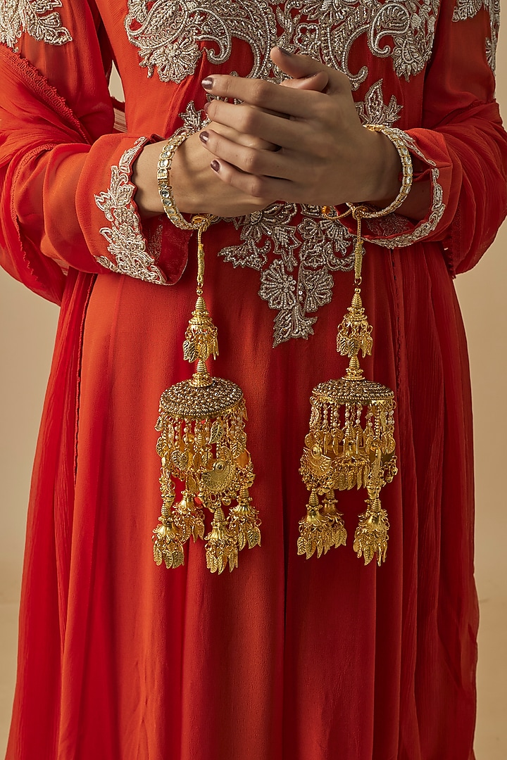 Gold Finish Kundan Polki & Pearl Strand Tying Kaleeras (Set Of 2) by Vivinia By Vidhi Mehra at Pernia's Pop Up Shop