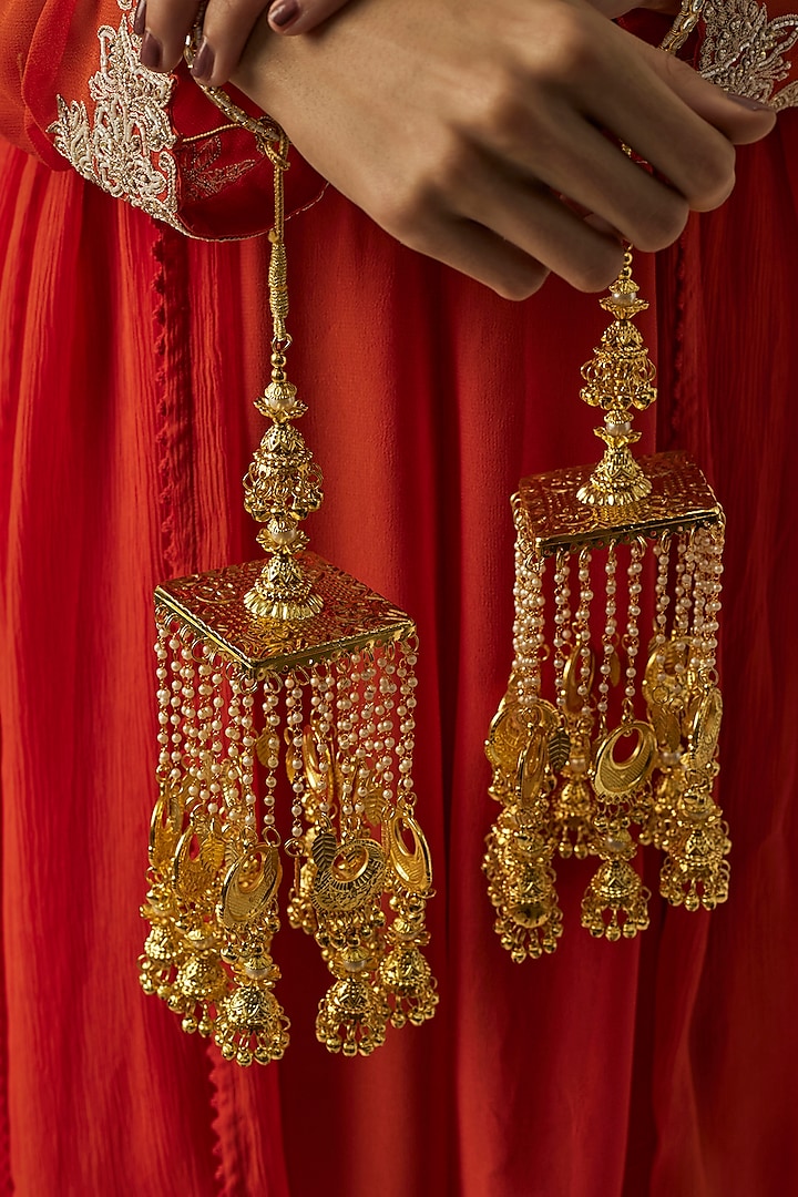 Gold Finish Kundan Polki & Pearl Strand Tying Kaleeras (Set Of 2) by Vivinia By Vidhi Mehra