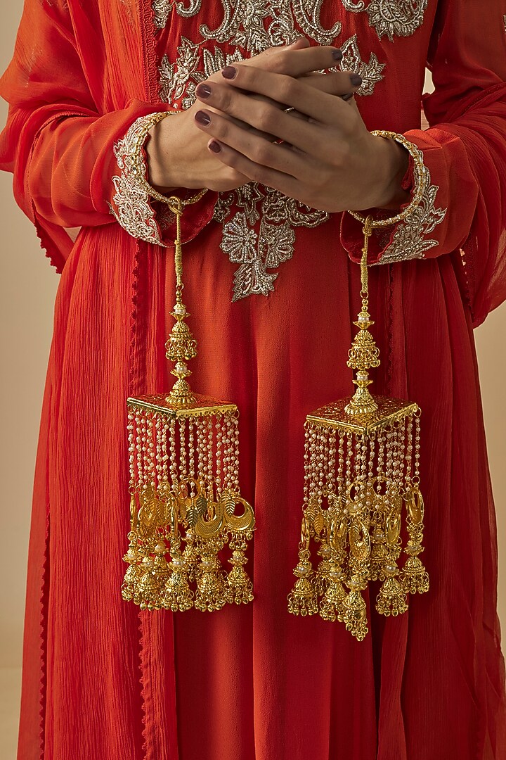 Gold Finish Kundan Polki & Pearl Strand Tying Kaleeras (Set Of 2) by Vivinia By Vidhi Mehra at Pernia's Pop Up Shop