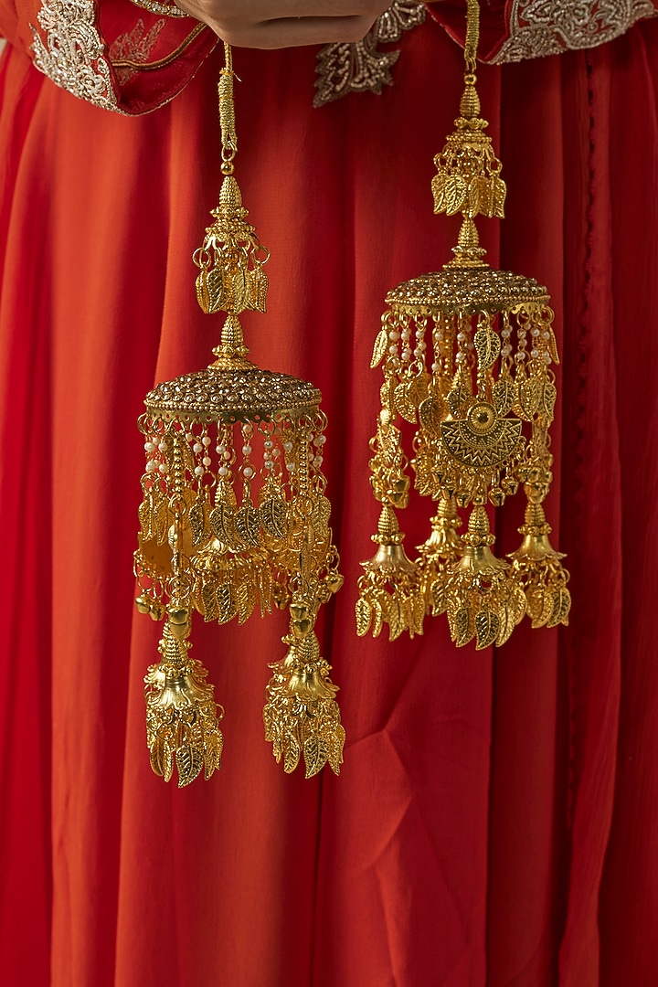 Gold Finish Kundan Polki & Pearl Strand Tying Kaleeras (Set Of 2) by Vivinia By Vidhi Mehra at Pernia's Pop Up Shop