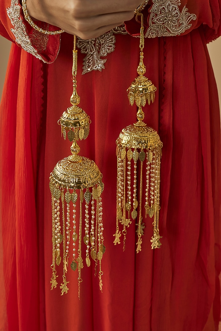 Gold Finish Kundan Polki & Pearl Strand Tying Kaleeras (Set Of 2) by Vivinia By Vidhi Mehra at Pernia's Pop Up Shop
