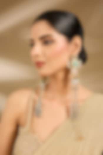 Gold Finish Green Stone & Tassel Chain Enameled Dangler Earrings by Vivinia By Vidhi Mehra at Pernia's Pop Up Shop