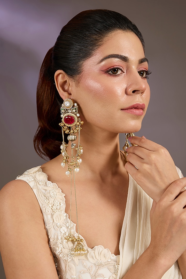 Gold Finish Kundan Polki & Pink Stone Dangler Earrings by Vivinia By Vidhi Mehra at Pernia's Pop Up Shop
