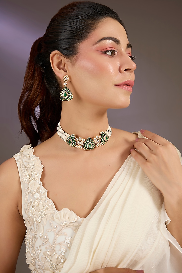Gold Finish Kundan Polki & Emerald Stone Choker Necklace Set by Vivinia By Vidhi Mehra at Pernia's Pop Up Shop