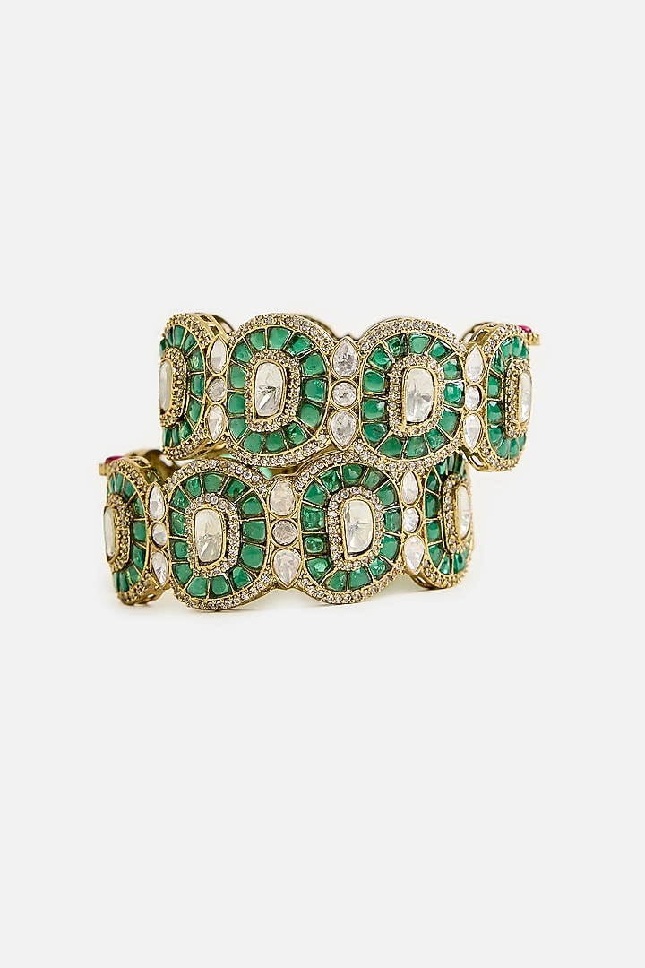 Gold Finish Kundan Polki & Green Stone Bangles (Set Of 2) by Vivinia By Vidhi Mehra at Pernia's Pop Up Shop