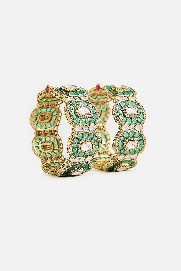 Gold Finish Kundan Polki & Green Stone Bangles (Set Of 2) by Vivinia By Vidhi Mehra at Pernia's Pop Up Shop