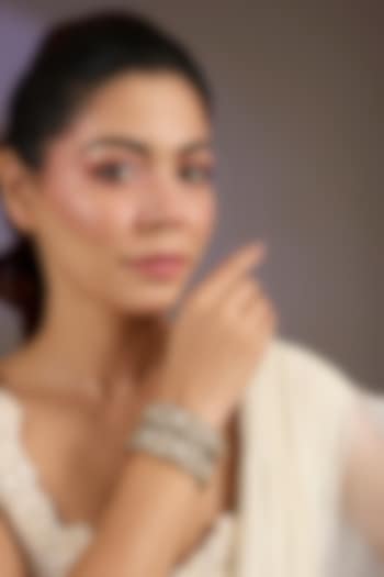 Gold Finish Moissanite Polki Bangles (Set Of 2) by Vivinia By Vidhi Mehra at Pernia's Pop Up Shop