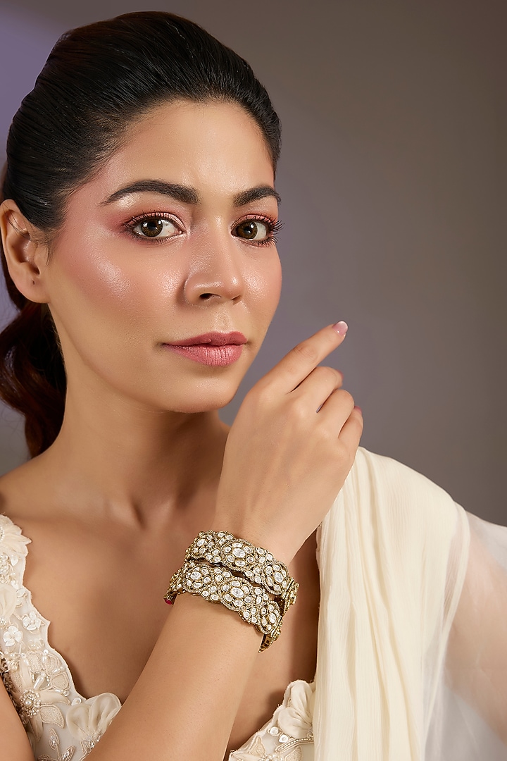 Gold Finish Moissanite Polki Bangles (Set Of 2) by Vivinia By Vidhi Mehra at Pernia's Pop Up Shop