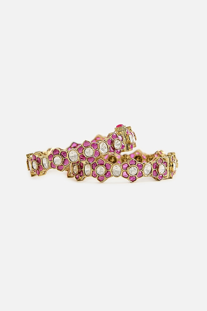Gold Finish Ruby Kundan Polki Floral Bangles (Set Of 2) by Vivinia By Vidhi Mehra at Pernia's Pop Up Shop
