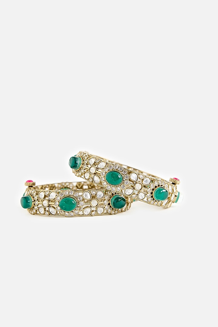 Gold Finish Kundan Polki & Green Stone Bangles (Set Of 2) by Vivinia By Vidhi Mehra at Pernia's Pop Up Shop
