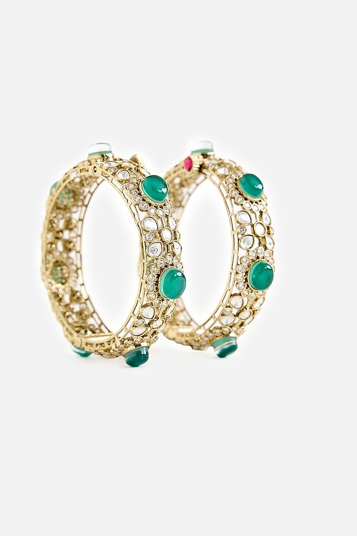 Gold Finish Kundan Polki & Green Stone Bangles (Set Of 2) by Vivinia By Vidhi Mehra at Pernia's Pop Up Shop