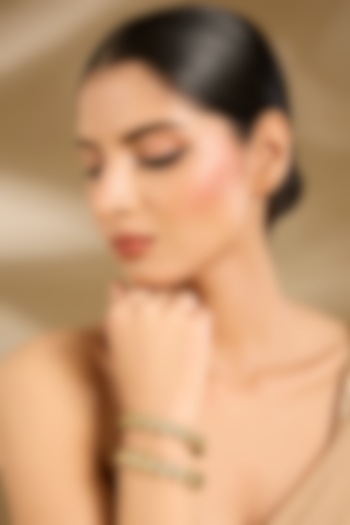 Gold Finish Pearl & Green Stone Bangles (Set Of 2) by Vivinia By Vidhi Mehra at Pernia's Pop Up Shop