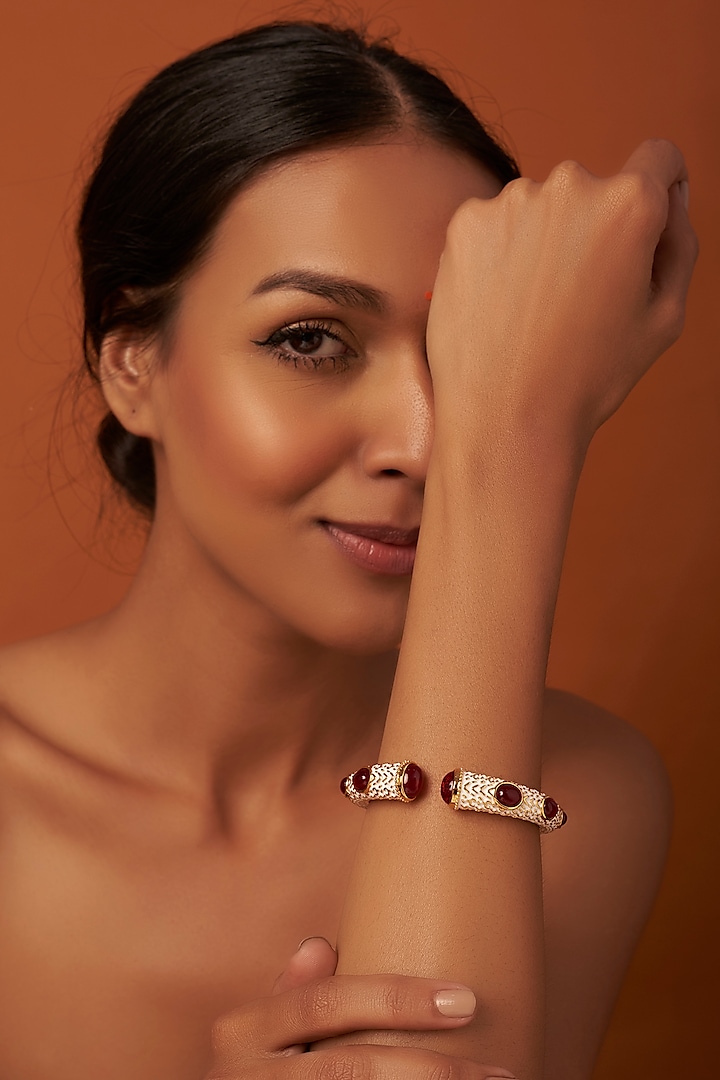 Gold Finish Enameled Kada With Synthetic Stones by Vivinia By Vidhi Mehra