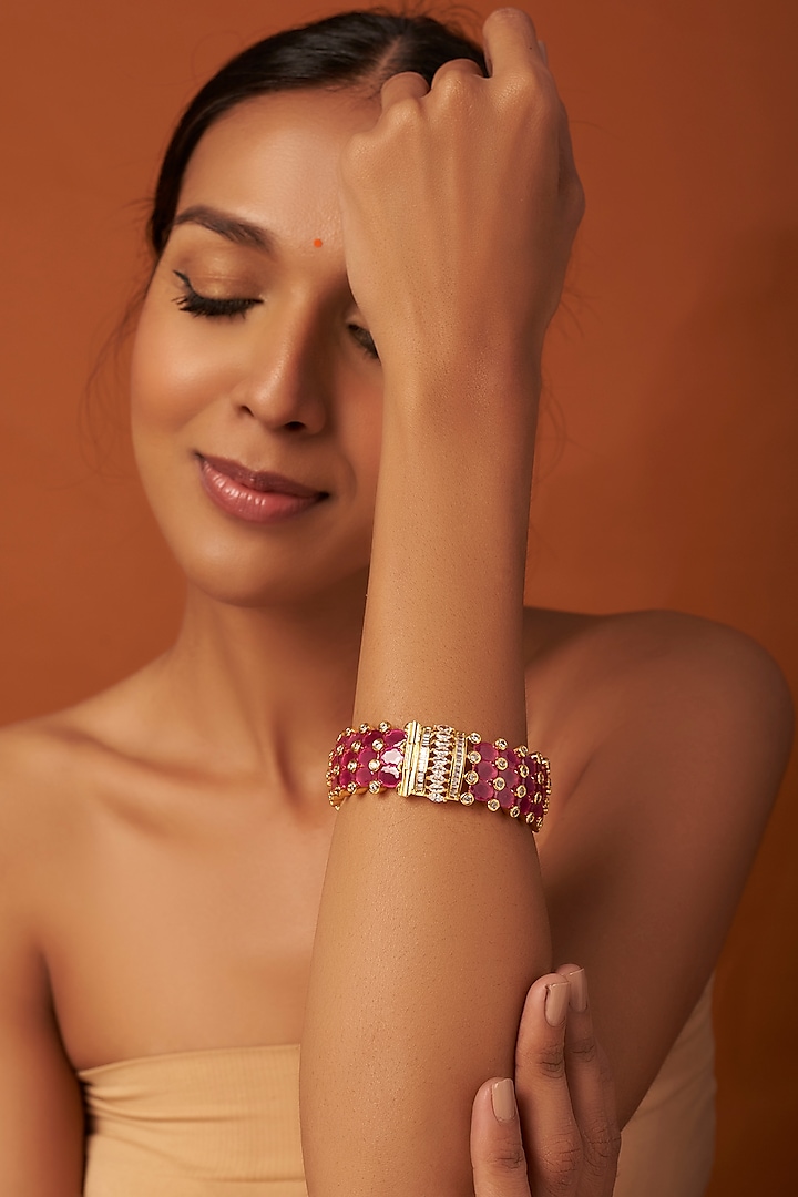 Gold Finish Ruby Synthetic Stones Bangle by Vivinia By Vidhi Mehra
