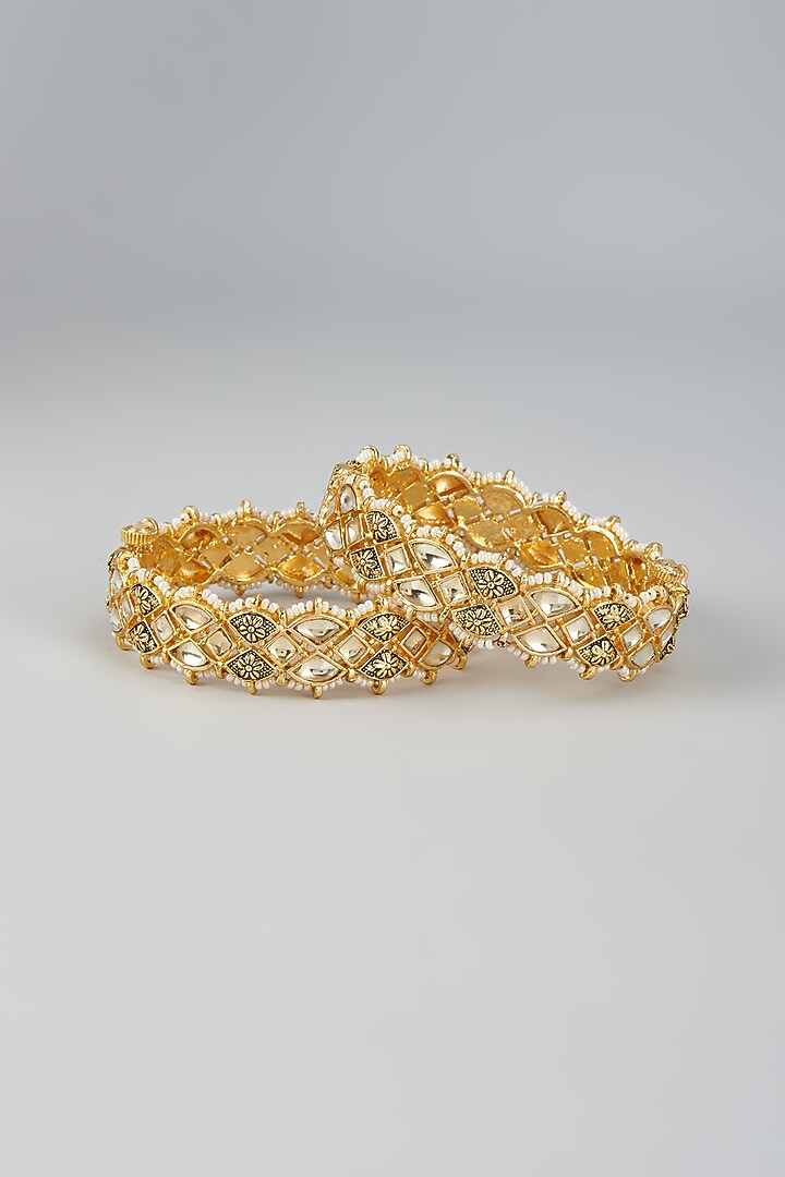 Gold Finish Kundan Polki & Beaded Meenakari Bangles (Set Of 2) by Vivinia By Vidhi Mehra at Pernia's Pop Up Shop