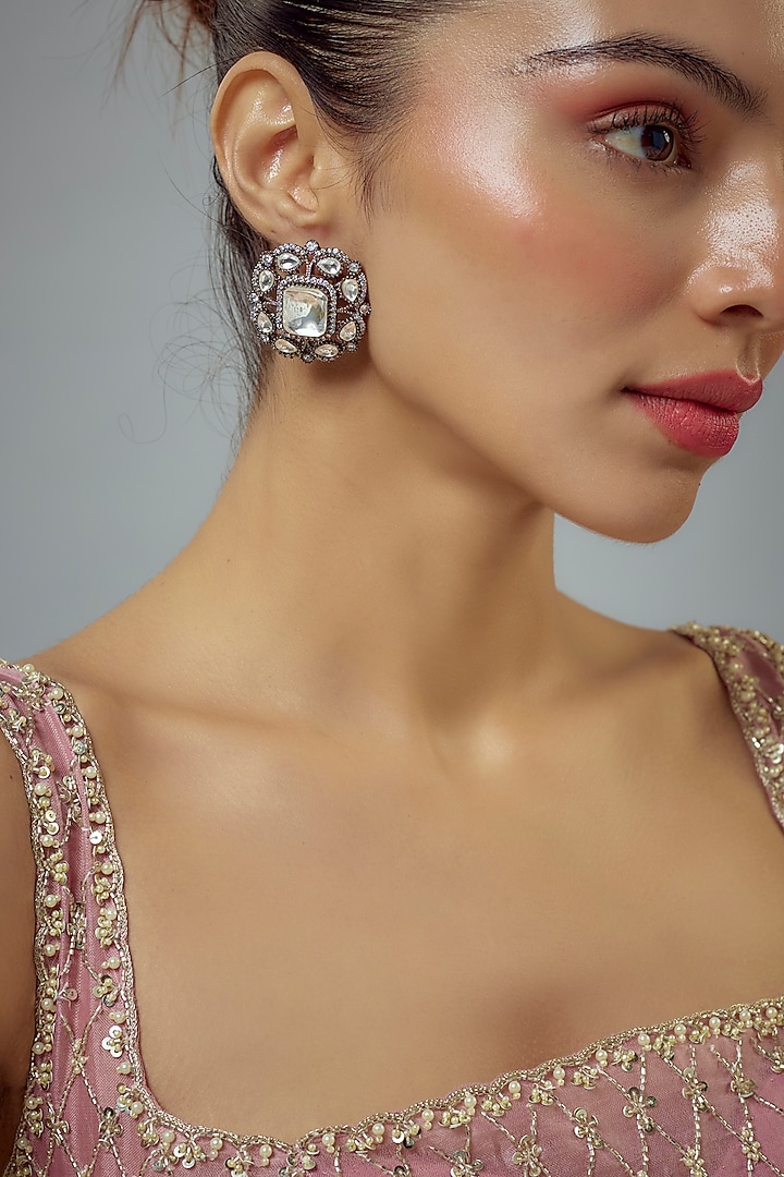 White Rhodium Finish Zircon Stud Earrings by Vivinia By Vidhi Mehra at Pernia's Pop Up Shop