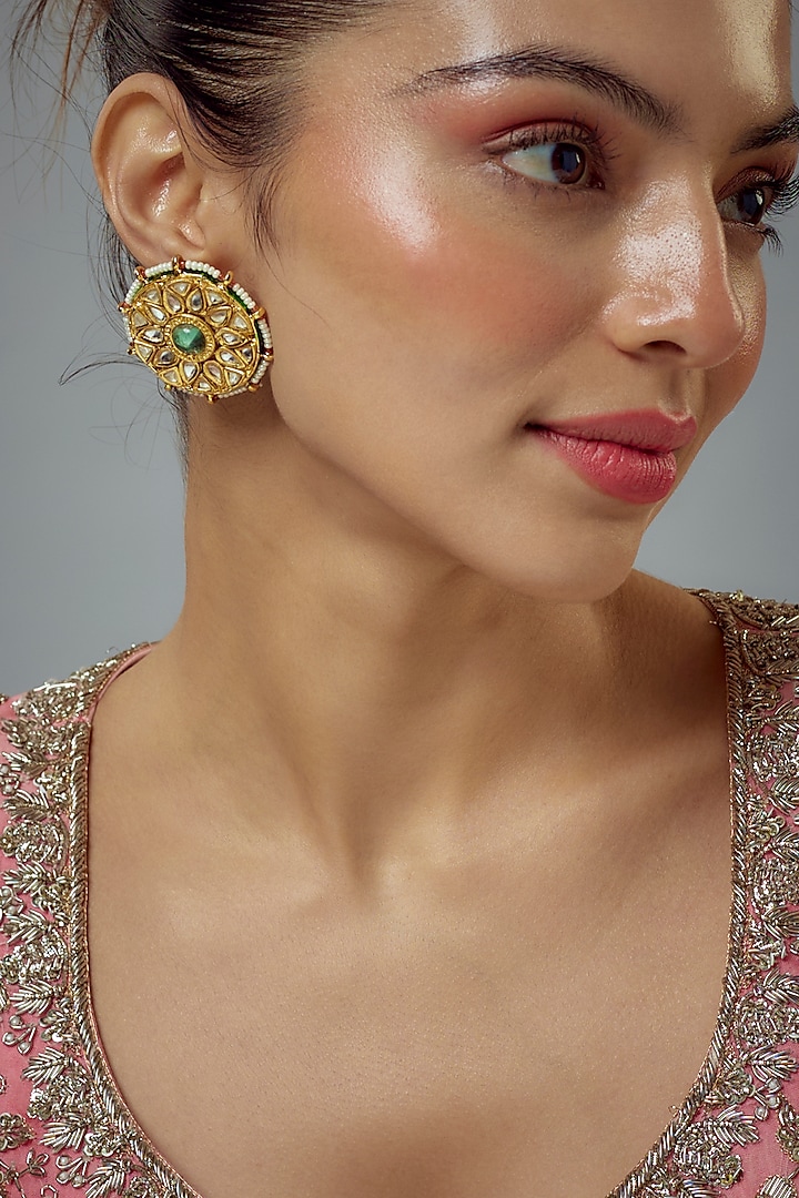 Gold Finish Kundan Polki Stud Earrings by Vivinia By Vidhi Mehra at Pernia's Pop Up Shop