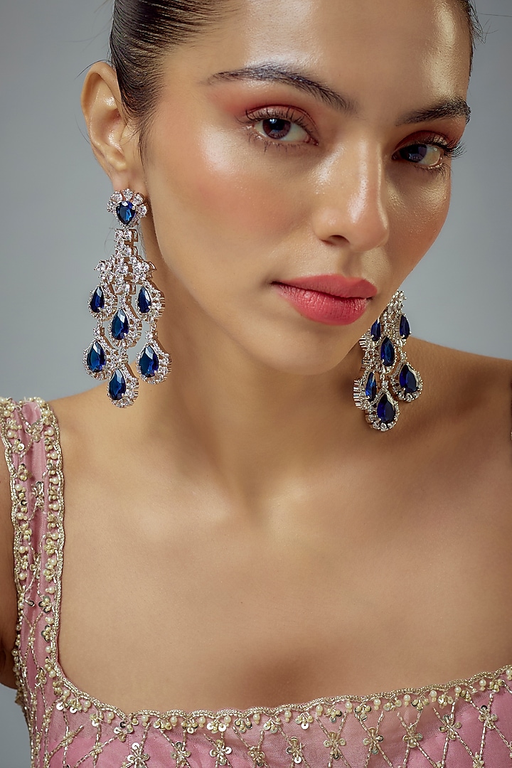 White Rhodium Finish Zircon Dangler Earrings by Vivinia By Vidhi Mehra at Pernia's Pop Up Shop