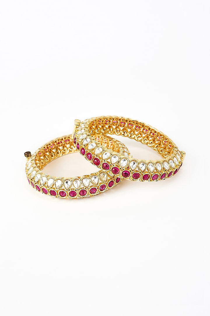 Gold Finish Kundan Polki Bangles (Set Of 2) by Vivinia By Vidhi Mehra at Pernia's Pop Up Shop