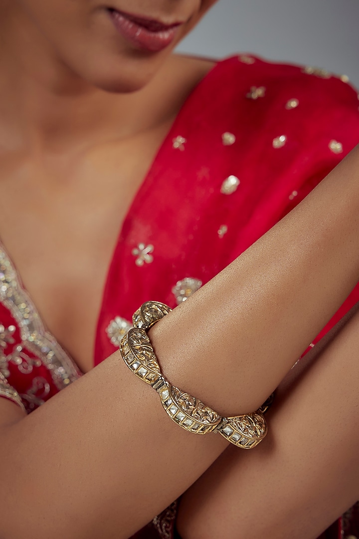 Gold Finish Kundan Polki Bangle by Vivinia By Vidhi Mehra at Pernia's Pop Up Shop