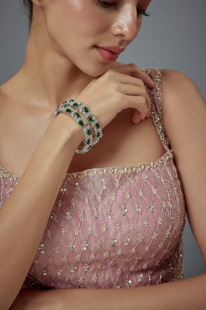 White Finish Green Zircon Bangles (Set Of 2) by Vivinia By Vidhi Mehra at Pernia's Pop Up Shop