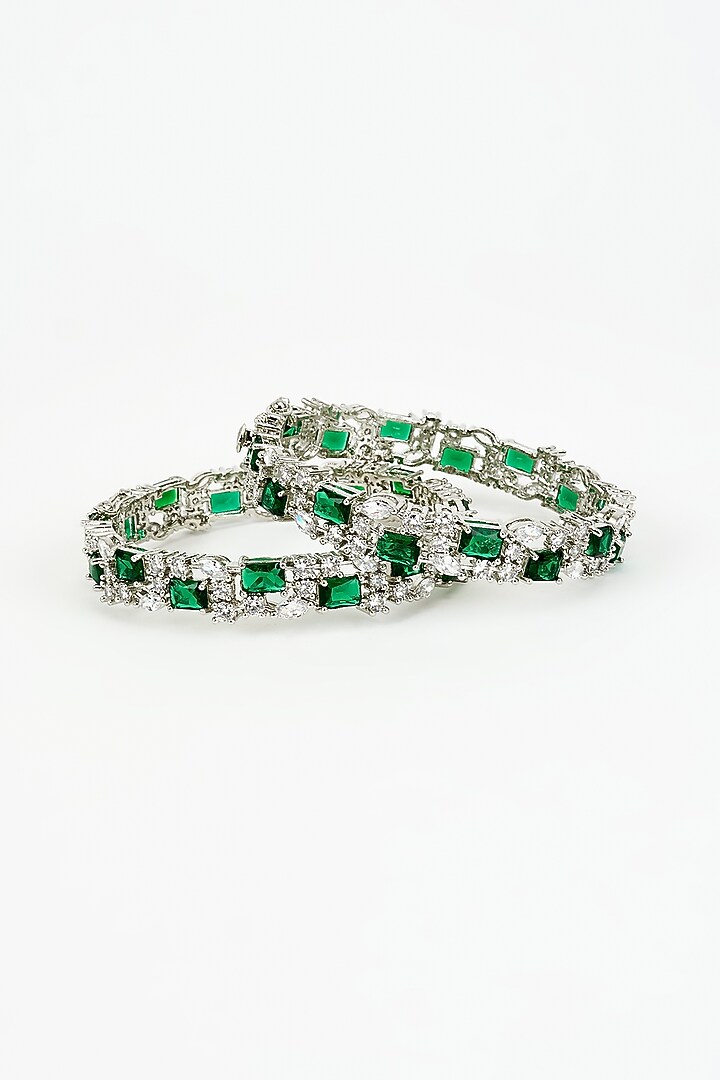 White Finish Green Zircon Bangles (Set Of 2) by Vivinia By Vidhi Mehra at Pernia's Pop Up Shop