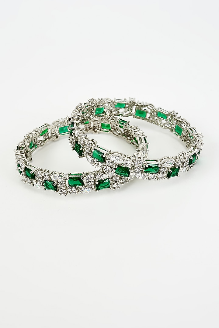 White Finish Green Zircon Bangles (Set Of 2) by Vivinia By Vidhi Mehra at Pernia's Pop Up Shop