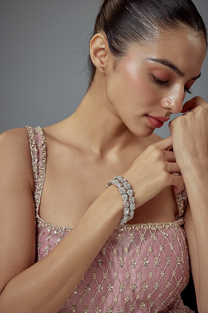 White Finish Zircon Bangles (Set Of 2) by Vivinia By Vidhi Mehra at Pernia's Pop Up Shop