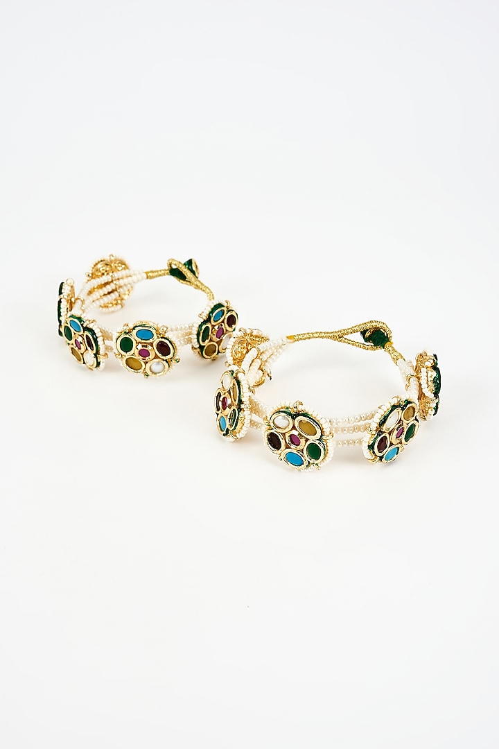 Gold Finish Kundan Polki Bangles (Set Of 2) by Vivinia By Vidhi Mehra at Pernia's Pop Up Shop