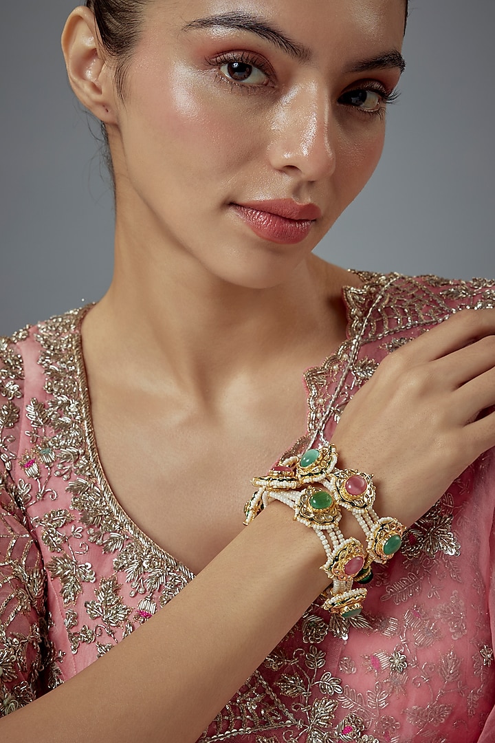 Gold Finish Kundan Polki Bangles (Set Of 2) by Vivinia By Vidhi Mehra at Pernia's Pop Up Shop