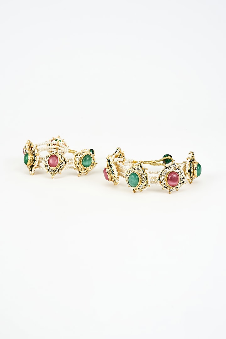 Gold Finish Kundan Polki Bangles (Set Of 2) by Vivinia By Vidhi Mehra at Pernia's Pop Up Shop