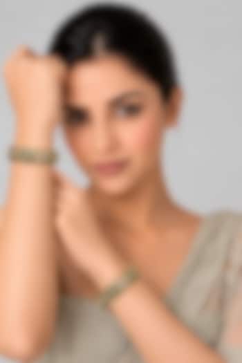 Gold Plated Emerald Stone & Moissanite Polki Floral Bangles (Set Of 2) by Vivinia By Vidhi Mehra at Pernia's Pop Up Shop