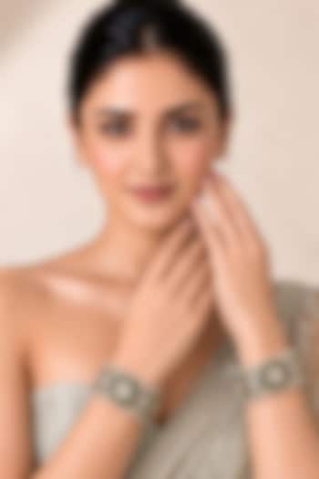 Gold Plated Moissanite Polki & Emerald Stone Bangles (Set Of 2) by Vivinia By Vidhi Mehra at Pernia's Pop Up Shop