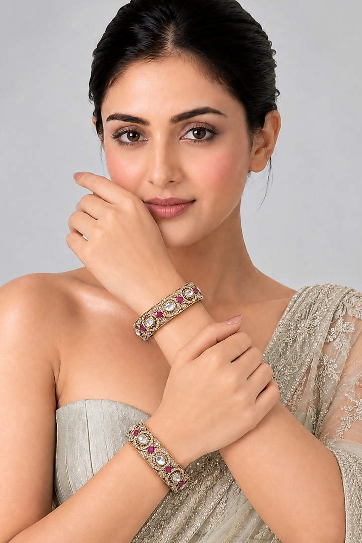 Gold Plated Moissanite Polki & Ruby Stone Bangles (Set Of 2) by Vivinia By Vidhi Mehra at Pernia's Pop Up Shop