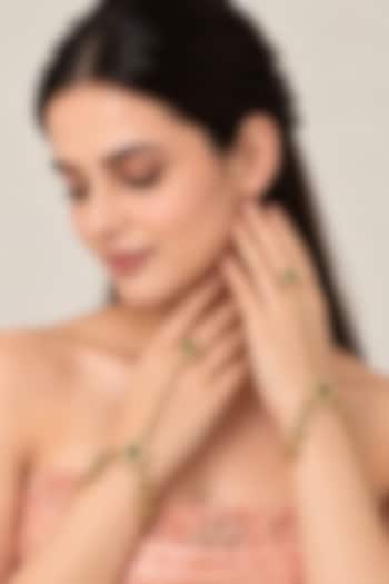 Gold Plated Kundan Polki & Pearl Haathphool (Set of 2) by Vivinia By Vidhi Mehra at Pernia's Pop Up Shop