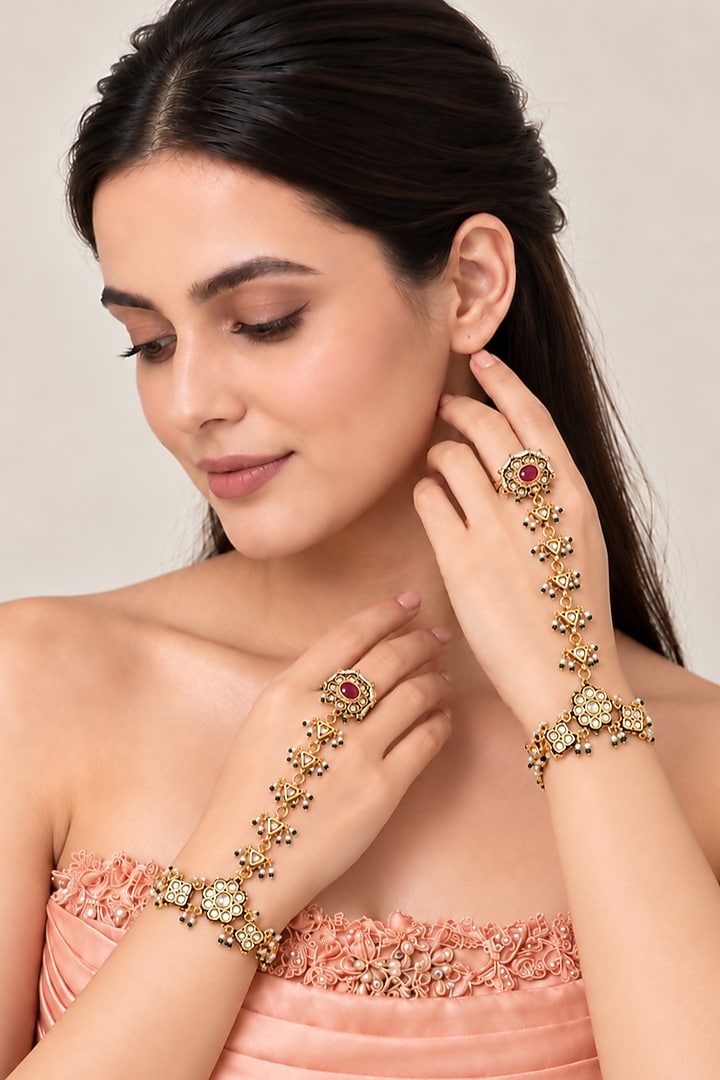 Gold Plated Kundan Polki & Pearl Haathphool (Set of 2) by Vivinia By Vidhi Mehra at Pernia's Pop Up Shop