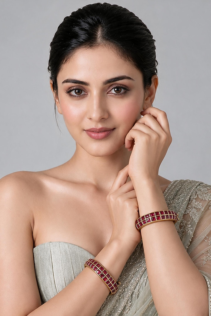 Gold Plated Ruby Stone Statement Bangles (Set Of 2) by Vivinia By Vidhi Mehra at Pernia's Pop Up Shop