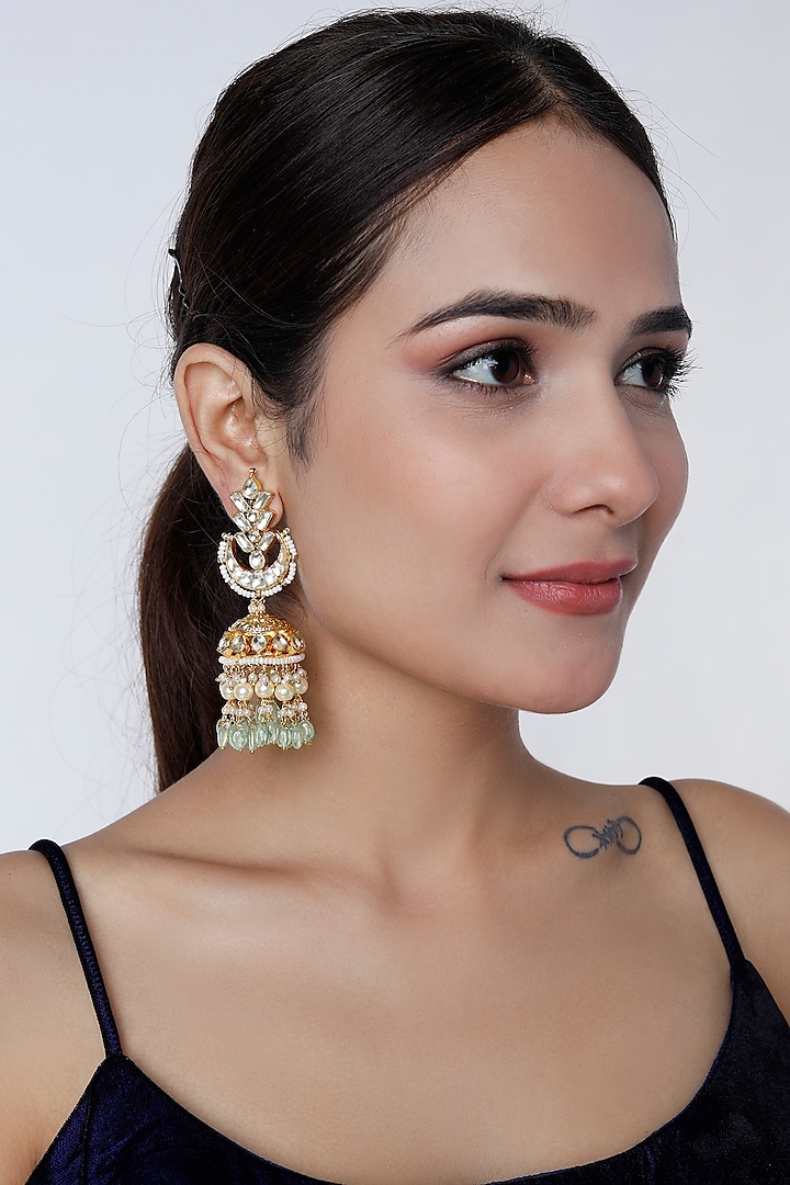 Gold Finish Mint Green Drop Jhumka Earrings by Vivinia By Vidhi Mehra