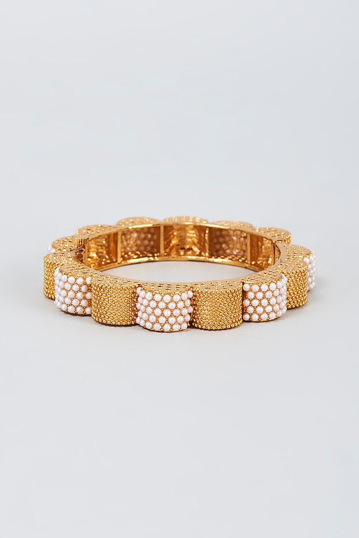 Gold Finish Zircon Bangle by Vivinia By Vidhi Mehra at Pernia's Pop Up Shop